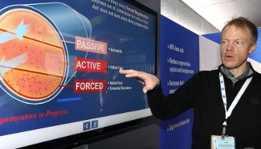 Man pointing to chart