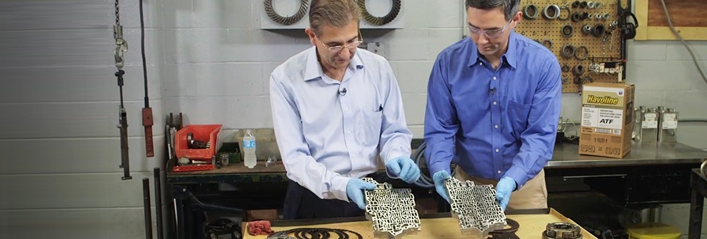 2 men working with ATF