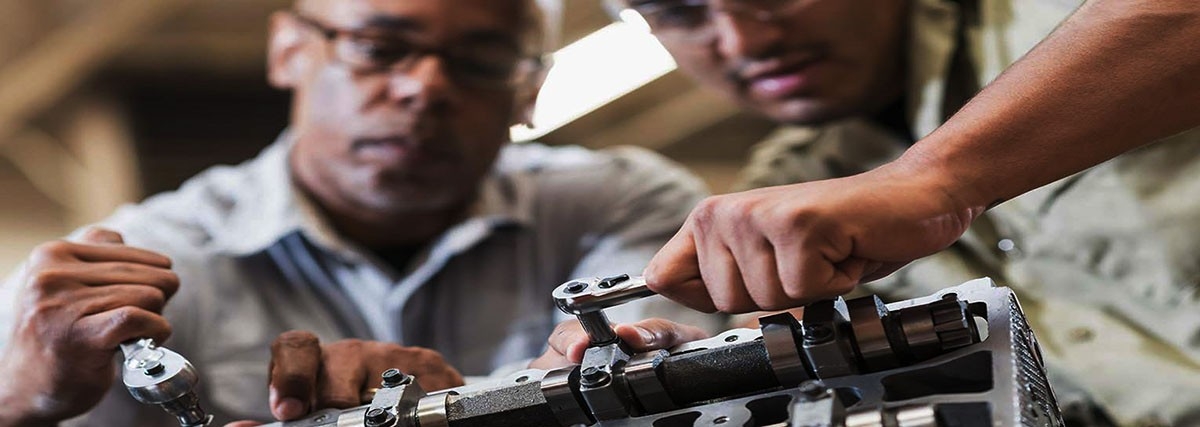 Men working on engine